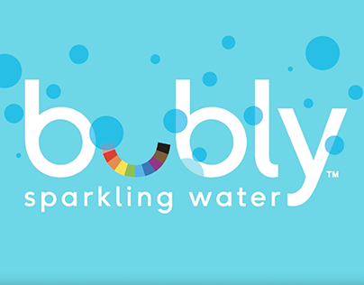 Logo for Bubly, a subsidiary of Pepsi-Co. The "u" in "bubly" has the colours of the rainbow. Underneath the logo it says sparkling water and the background is a sky blue with bubbles coloured slightly darker blue.